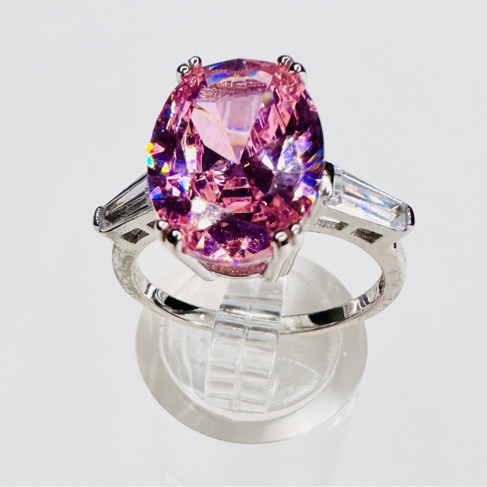 Elegant Sterling Silver Ring with Facet Cut Pink Gemstone and Baguettes